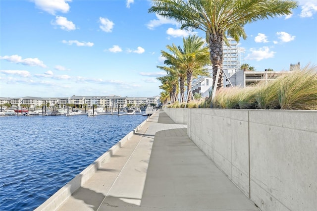 view of pool featuring a water view