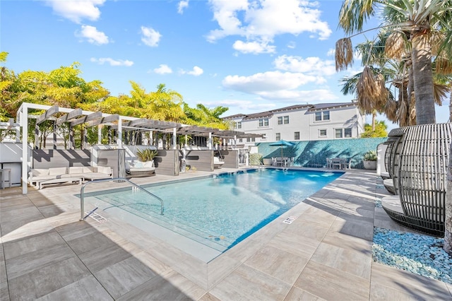 view of pool featuring a pergola and a patio area