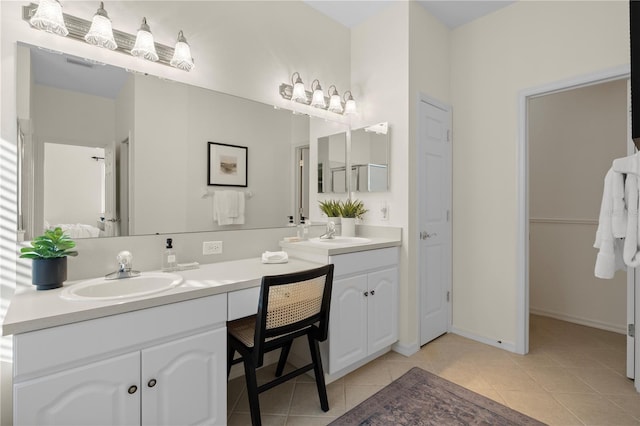 bathroom with vanity and tile patterned floors