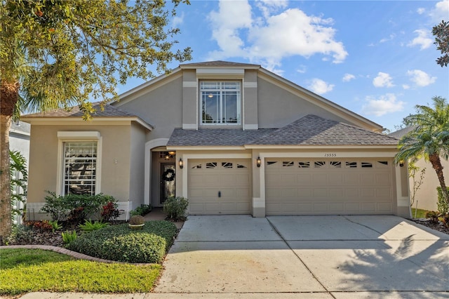 front of property with a garage