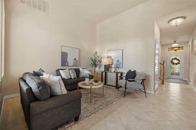 living room with light tile patterned floors