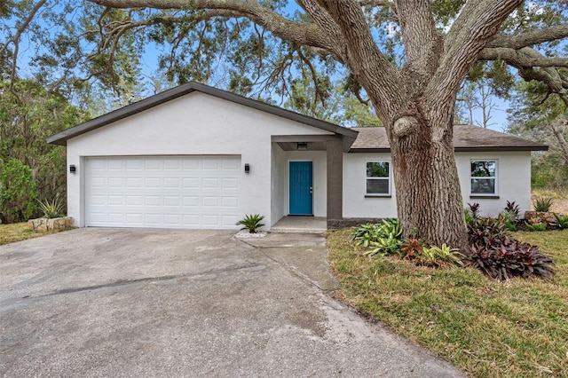 single story home with a garage