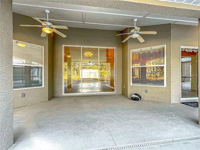 view of patio with ceiling fan