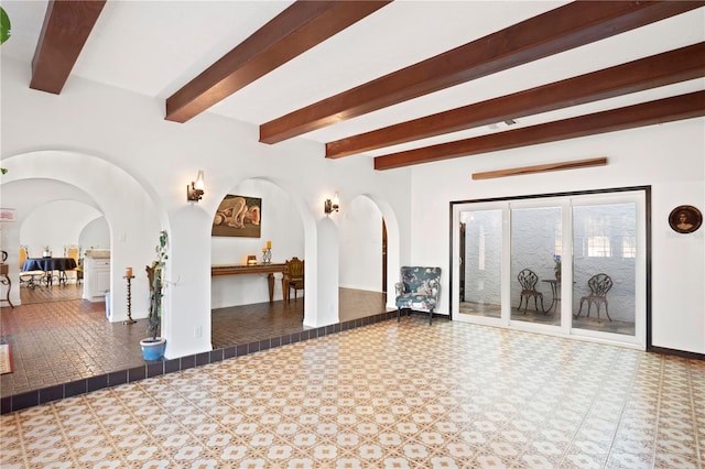 living room with beamed ceiling