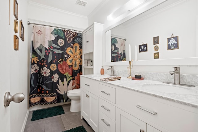 bathroom featuring tile patterned floors, ornamental molding, toilet, and vanity