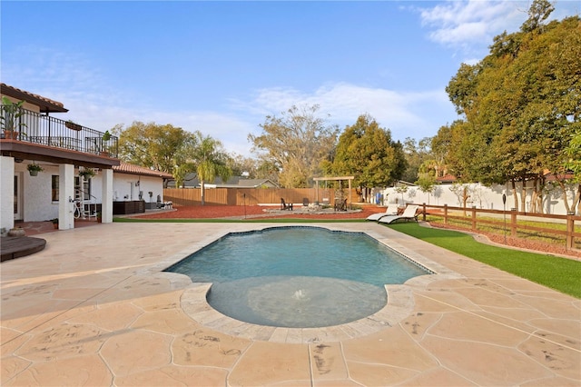 view of swimming pool featuring a patio