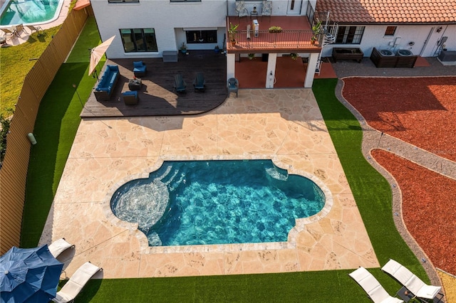 view of swimming pool with a patio