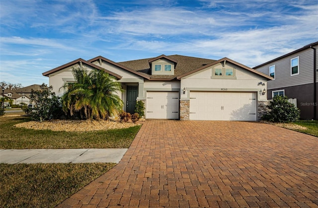 view of front of property featuring a garage