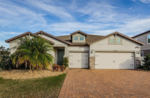 view of front of property with a garage