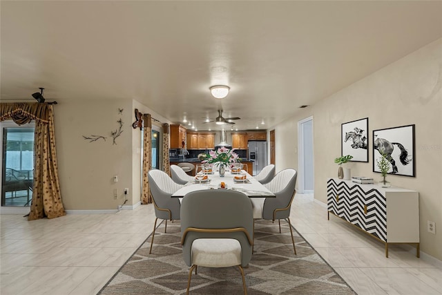 dining area with ceiling fan