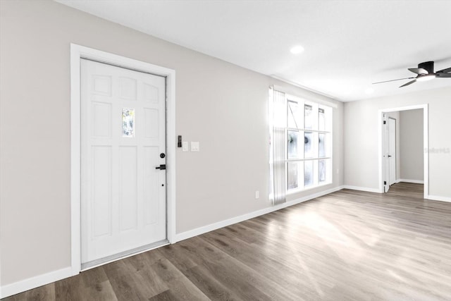 foyer entrance featuring hardwood / wood-style flooring and ceiling fan