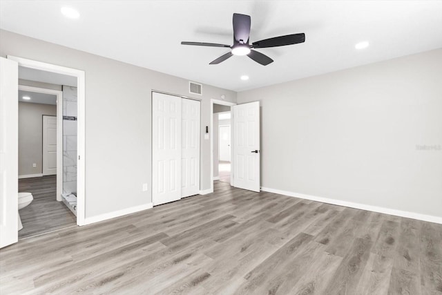 unfurnished bedroom with a closet, ceiling fan, and light hardwood / wood-style flooring