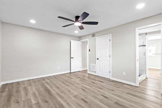 unfurnished bedroom with light hardwood / wood-style floors and ceiling fan