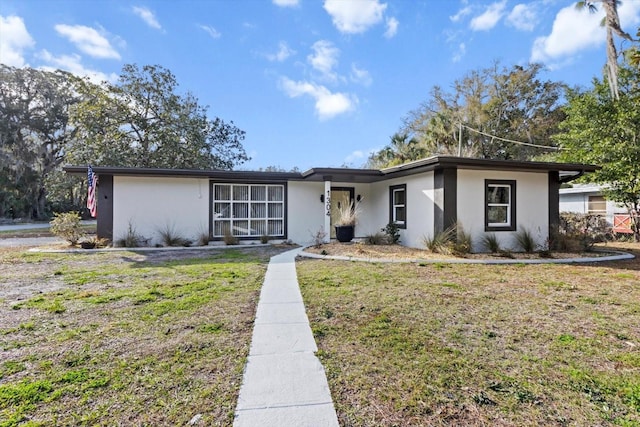 view of front of home with a front yard