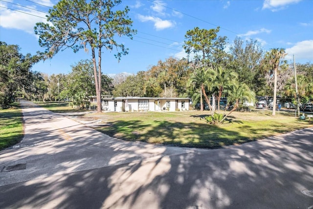 view of front of property with a front lawn