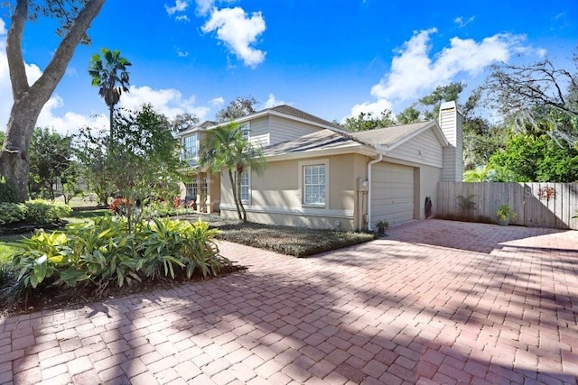 view of front of home with a garage