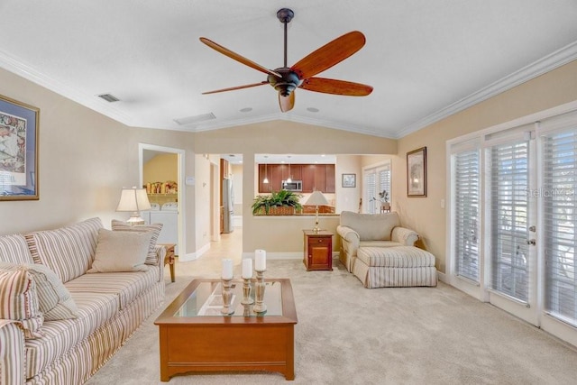 carpeted living room featuring crown molding, ceiling fan, and lofted ceiling