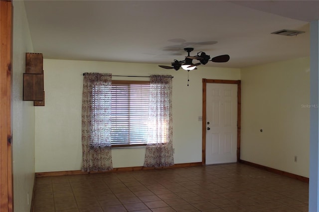 1322 Kenmore St, Port Charlotte, FL 33952 - spare room featuring tile patterned flooring and ceiling fan