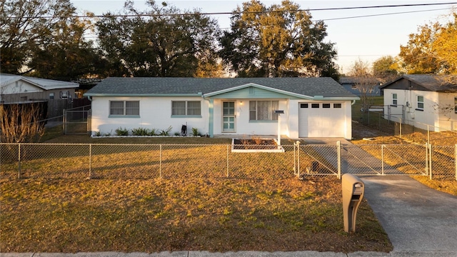 ranch-style home with a garage and a front yard