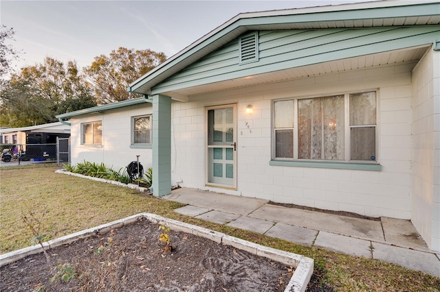 exterior space with a front lawn