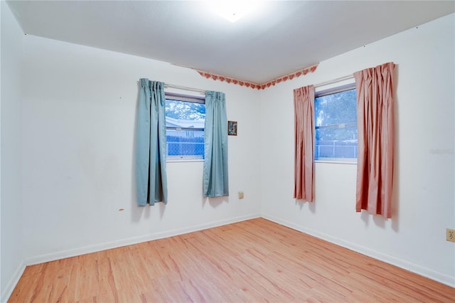 empty room with light wood-type flooring