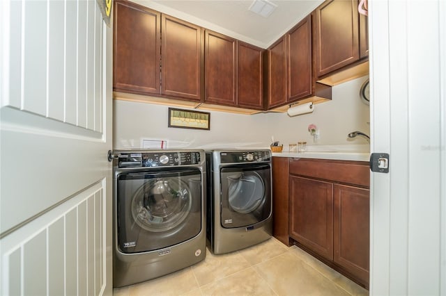 4748 Ballast Crest Cv, Land O Lakes, FL 34638 - washroom featuring cabinet space, light tile patterned floors, and separate washer and dryer