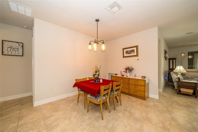 4748 Ballast Crest Cv, Land O Lakes, FL 34638 - dining room with a chandelier and baseboards