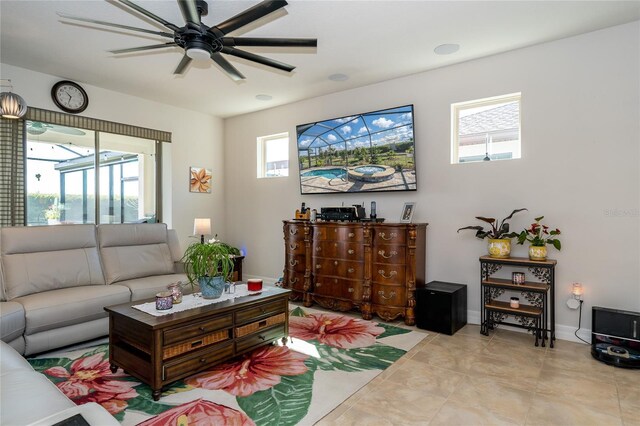 4748 Ballast Crest Cv, Land O Lakes, FL 34638 - living room featuring a ceiling fan, tile patterned flooring, and baseboards