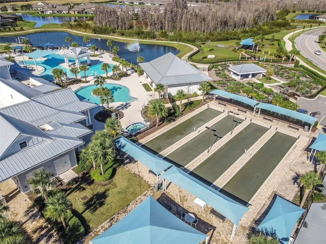 4748 Ballast Crest Cv, Land O Lakes, FL 34638 - drone / aerial view of a pool area and a nearby body of water