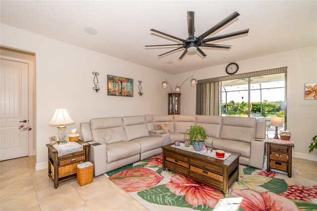 4748 Ballast Crest Cv, Land O Lakes, FL 34638 - living area featuring a ceiling fan, baseboards, and light tile patterned floors