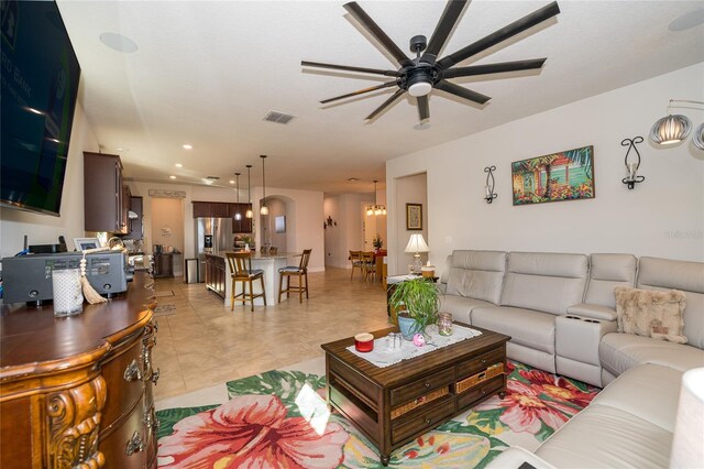 4748 Ballast Crest Cv, Land O Lakes, FL 34638 - living room with ceiling fan, a chandelier, light tile patterned flooring, and recessed lighting