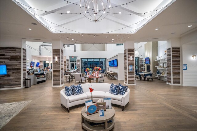 4748 Ballast Crest Cv, Land O Lakes, FL 34638 - living room featuring a towering ceiling, a chandelier, and recessed lighting