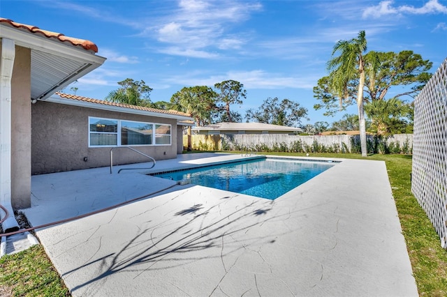 view of pool with a patio