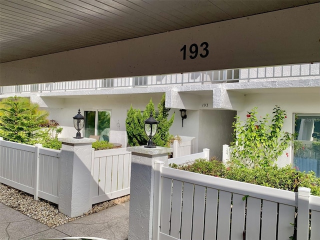 exterior space with a fenced front yard