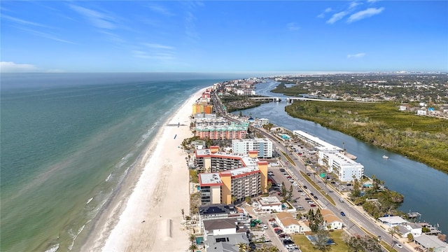 drone / aerial view with a water view and a view of the beach