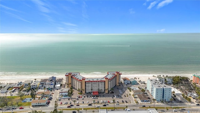 bird's eye view with a water view and a view of the beach