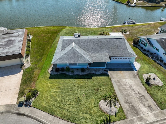 bird's eye view with a water view