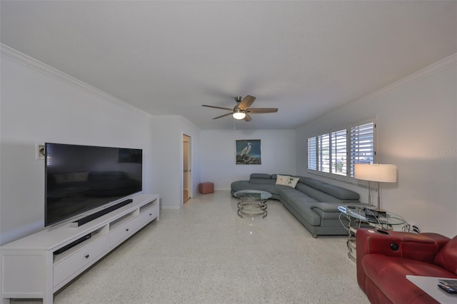 living room featuring ornamental molding and ceiling fan