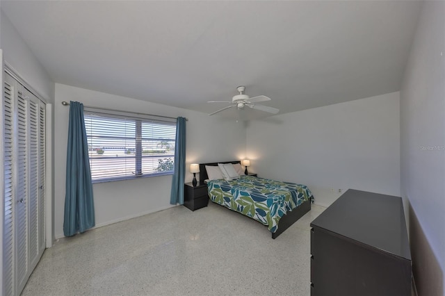 bedroom featuring a closet and ceiling fan