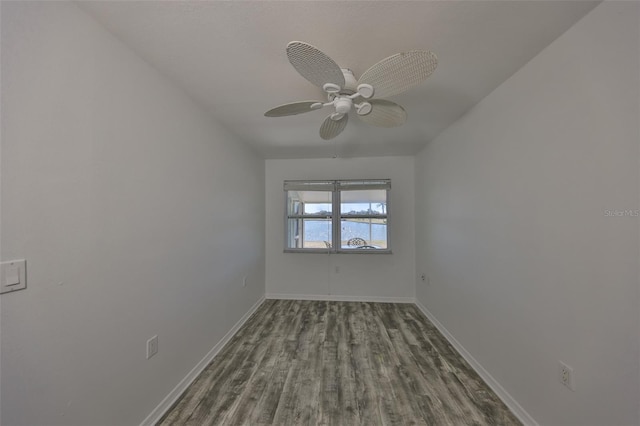 unfurnished room featuring hardwood / wood-style floors and ceiling fan