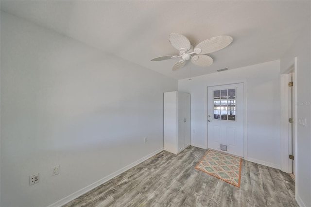 unfurnished bedroom featuring ceiling fan and light hardwood / wood-style flooring