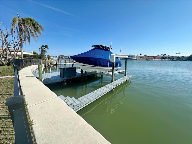 dock area featuring a water view