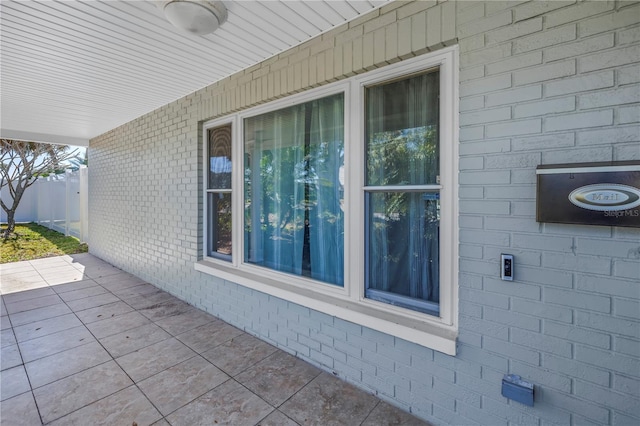 view of side of home with a patio