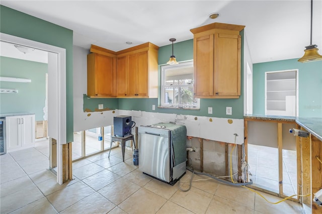 kitchen featuring light tile patterned flooring, pendant lighting, beverage cooler, and refrigerator