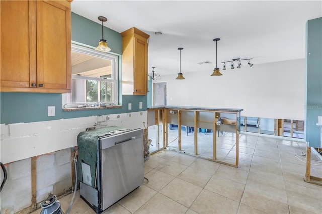 kitchen with pendant lighting, track lighting, dishwasher, and light tile patterned flooring