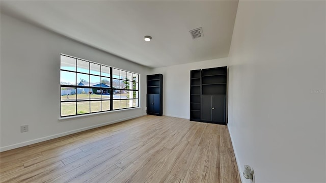 unfurnished bedroom featuring light hardwood / wood-style floors