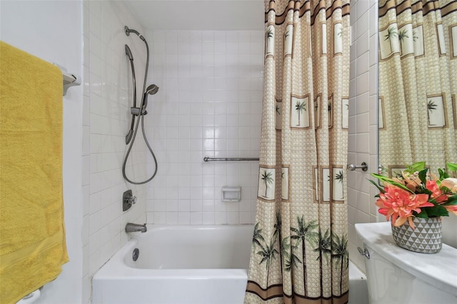 bathroom with toilet and shower / tub combo