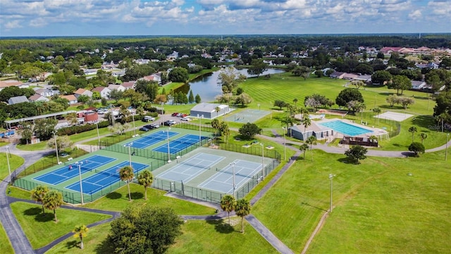 birds eye view of property featuring a water view