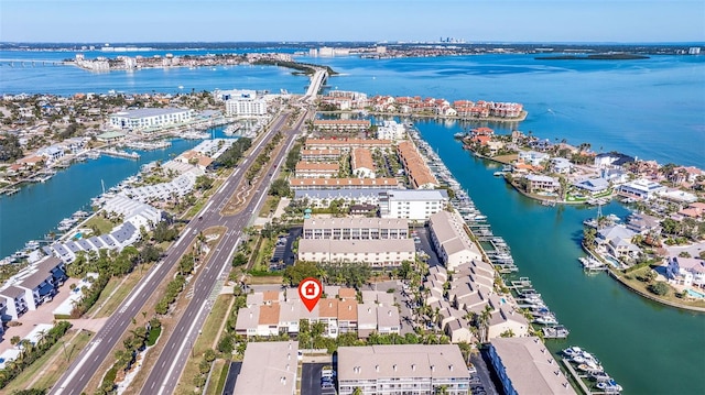 birds eye view of property featuring a water view