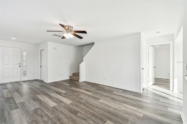 unfurnished living room featuring wood-type flooring and ceiling fan